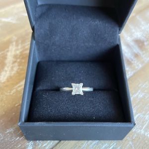 3 quarter carat diamond ring . Princess cut